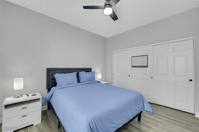 8836 Martin Downs Pl, Las Vegas, NV 89131 - bedroom with light wood-style floors, a closet, and a ceiling fan