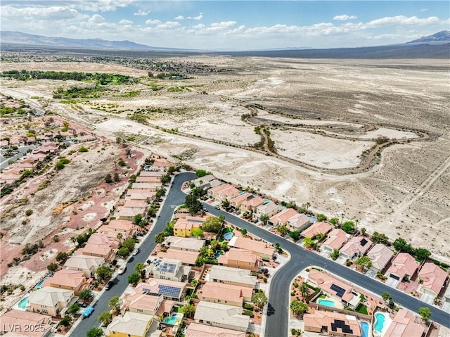 8836 Martin Downs Pl, Las Vegas, NV 89131 - aerial overview of property's location with a mountain backdrop and nearby suburban area