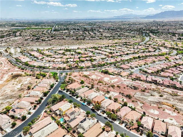8836 Martin Downs Pl, Las Vegas, NV 89131 - aerial overview of property's location with mountains and nearby suburban area