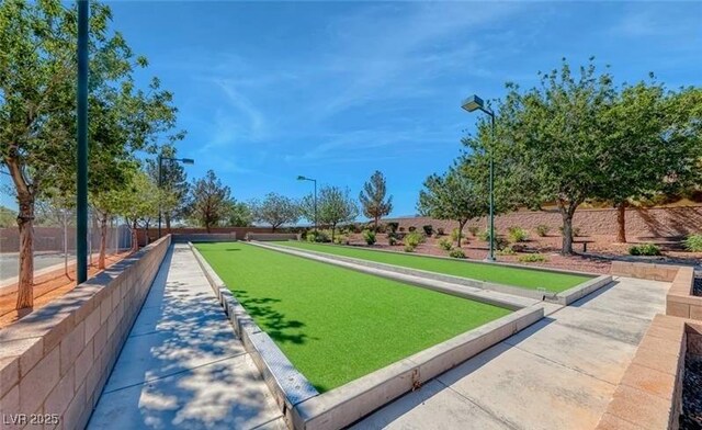 8836 Martin Downs Pl, Las Vegas, NV 89131 - view of home's community with a game area and fence