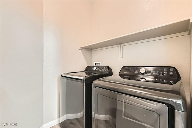 8469 Cheerful Brook Ave, Las Vegas, NV 89143 - laundry room with independent washer and dryer, wood finished floors, and baseboards