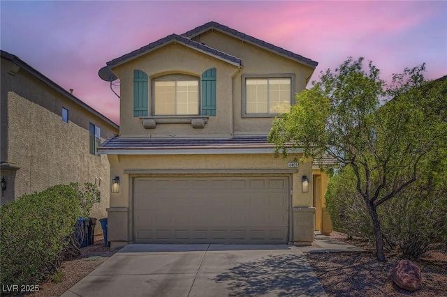 8469 Cheerful Brook Ave, Las Vegas, NV 89143 - view of front of house with stucco siding, an attached garage, and concrete driveway