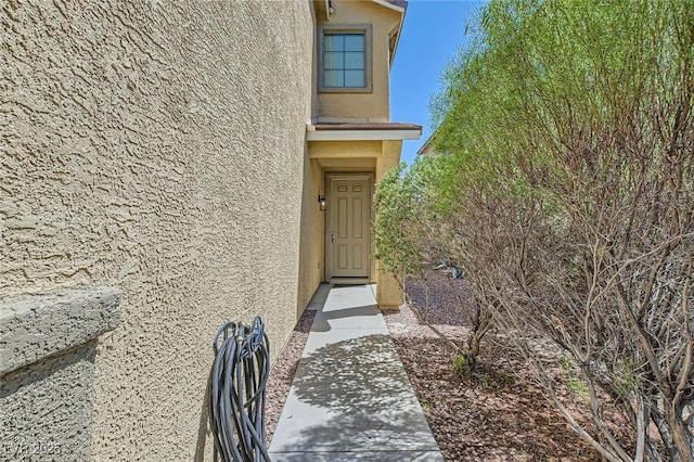 8469 Cheerful Brook Ave, Las Vegas, NV 89143 - property entrance featuring stucco siding