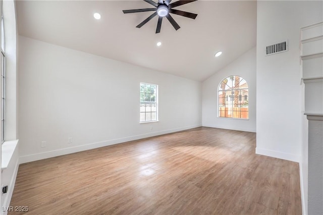 2107 Fountain Springs Dr, Henderson, NV 89074 - unfurnished living room featuring ceiling fan, wood finished floors, baseboards, recessed lighting, and high vaulted ceiling