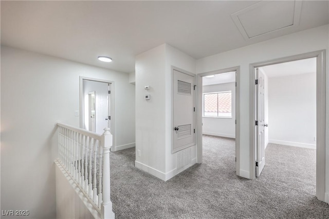 2107 Fountain Springs Dr, Henderson, NV 89074 - hall with carpet, baseboards, and an upstairs landing