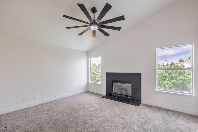 2107 Fountain Springs Dr, Henderson, NV 89074 - unfurnished living room with high vaulted ceiling, plenty of natural light, carpet, a fireplace with flush hearth, and ceiling fan