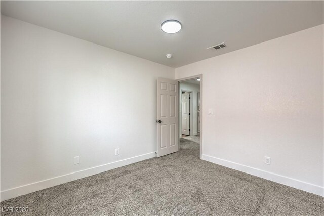 2107 Fountain Springs Dr, Henderson, NV 89074 - carpeted empty room with baseboards