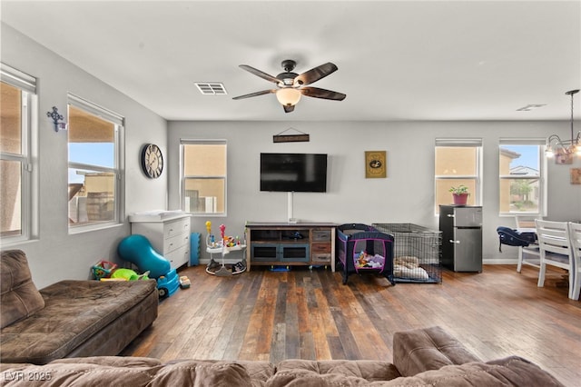 2672 Painted Mist Ct, Las Vegas, NV 89142 - living room featuring a ceiling fan, healthy amount of natural light, and wood-type flooring