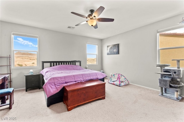 2672 Painted Mist Ct, Las Vegas, NV 89142 - carpeted bedroom with baseboards and ceiling fan