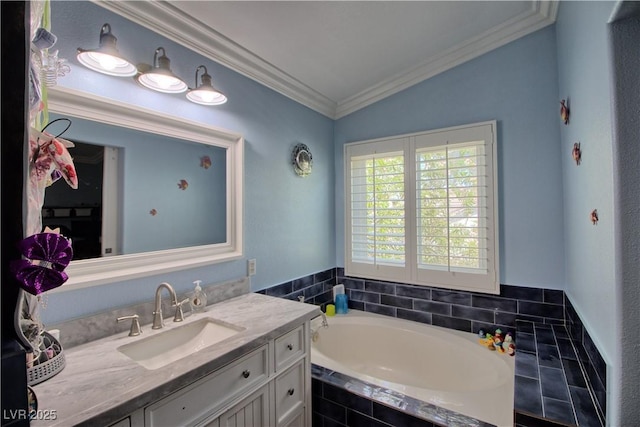 bathroom featuring a garden tub, vanity, ornamental molding, and lofted ceiling