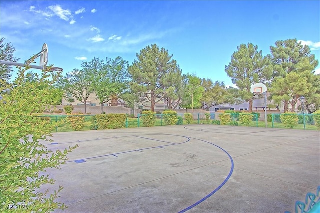 view of sport court featuring community basketball court and fence