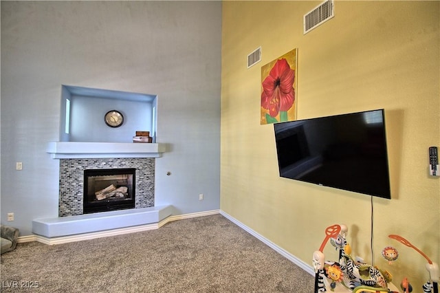7728 Whispering River St, Las Vegas, NV 89131 - living area with a fireplace, carpet, and baseboards
