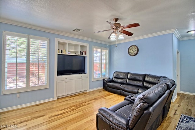 7728 Whispering River St, Las Vegas, NV 89131 - living room with plenty of natural light, light wood-style floors, a ceiling fan, baseboards, and ornamental molding