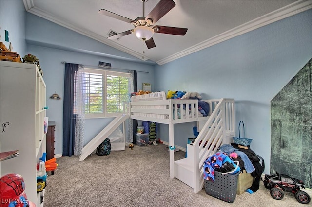 bedroom with crown molding, carpet, lofted ceiling, baseboards, and a ceiling fan