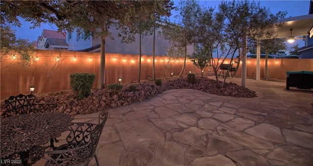 7728 Whispering River St, Las Vegas, NV 89131 - fenced backyard with a patio