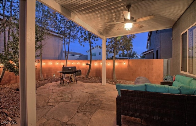 7728 Whispering River St, Las Vegas, NV 89131 - fenced backyard with an outdoor living space, a patio, area for grilling, and ceiling fan
