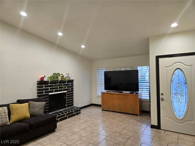 6361 Copperfield Ave, Las Vegas, NV 89108 - living area featuring a fireplace, recessed lighting, baseboards, and lofted ceiling