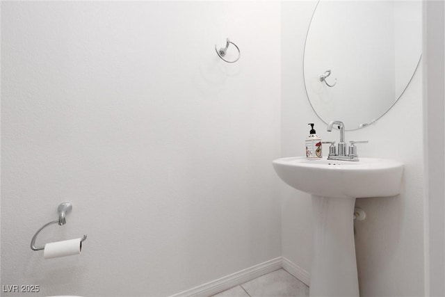 bathroom featuring tile patterned floors and baseboards