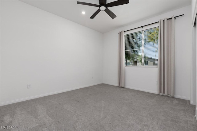 carpeted empty room featuring a ceiling fan, baseboards, and recessed lighting