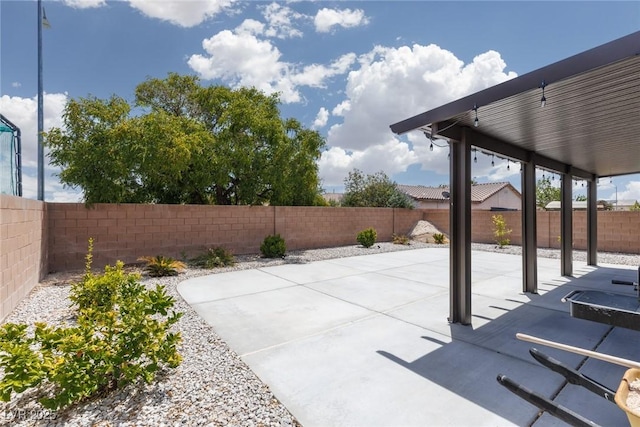 view of patio featuring a fenced backyard