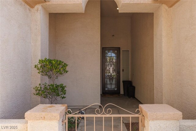 3522 Shonna Way N, Las Vegas, NV 89032 - doorway to property featuring stucco siding and a gate