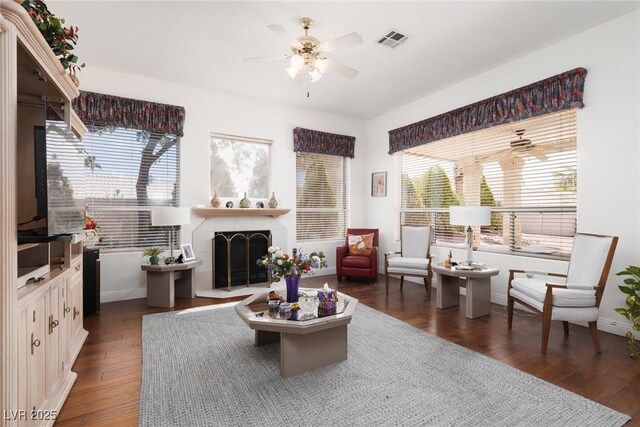 3522 Shonna Way N, Las Vegas, NV 89032 - living room featuring a ceiling fan, plenty of natural light, and dark wood finished floors