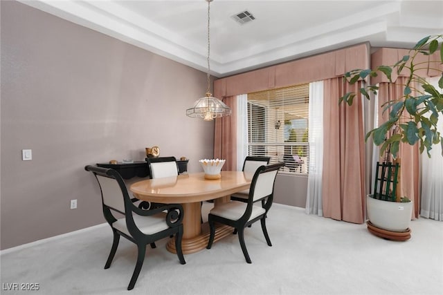3522 Shonna Way N, Las Vegas, NV 89032 - dining room featuring a tray ceiling and light carpet