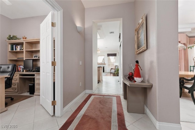 3522 Shonna Way N, Las Vegas, NV 89032 - corridor with light tile patterned flooring and a desk