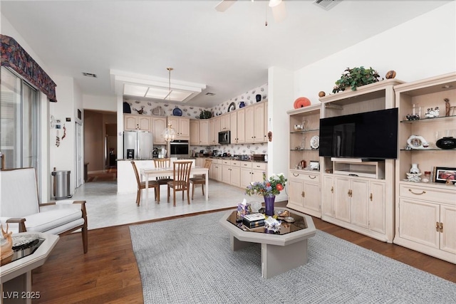 3522 Shonna Way N, Las Vegas, NV 89032 - living area with dark wood finished floors and ceiling fan