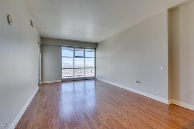 150 Las Vegas Blvd Unit 2003, Las Vegas, NV 89101 - empty room with wood finished floors and baseboards