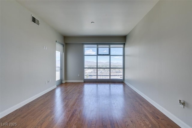 150 Las Vegas Blvd Unit 2003, Las Vegas, NV 89101 - empty room featuring dark wood-type flooring and baseboards