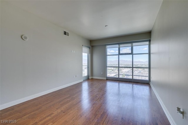 150 Las Vegas Blvd Unit 2003, Las Vegas, NV 89101 - unfurnished room featuring dark wood finished floors and baseboards