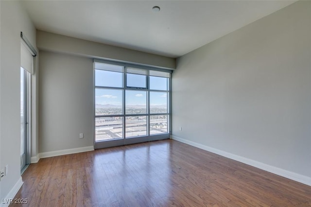 150 Las Vegas Blvd Unit 2003, Las Vegas, NV 89101 - unfurnished room featuring wood finished floors and baseboards
