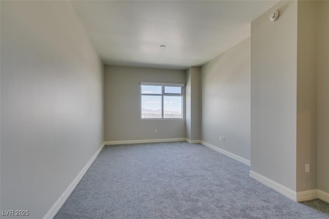 150 Las Vegas Blvd Unit 2003, Las Vegas, NV 89101 - carpeted empty room featuring a smoke detector and baseboards