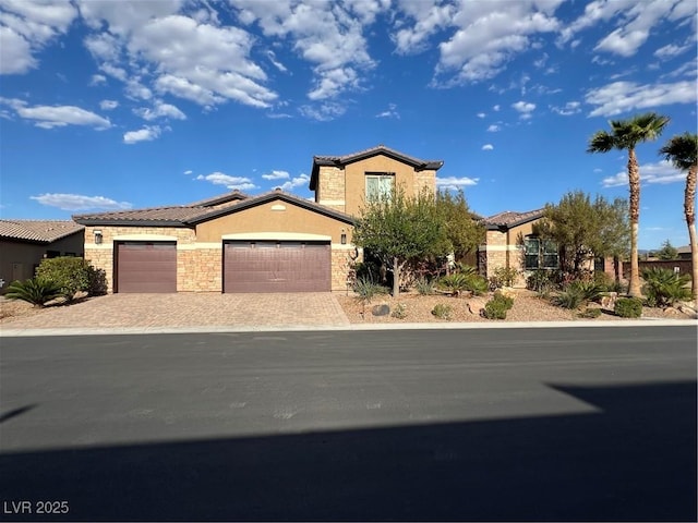 11088 Westcroft Way, Las Vegas, NV 89183 - view of front of property featuring stucco siding, a tiled roof, and an attached garage