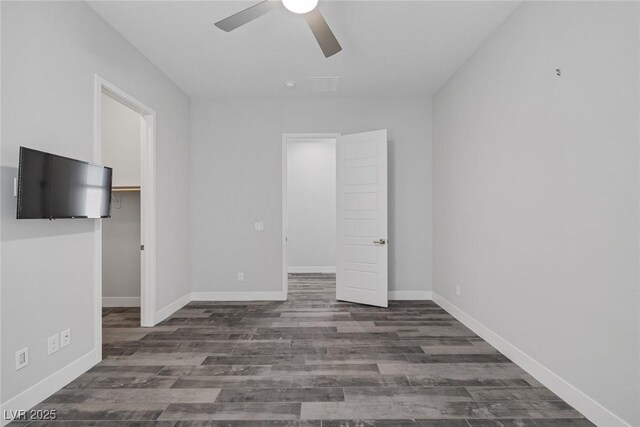 11088 Westcroft Way, Las Vegas, NV 89183 - unfurnished bedroom featuring wood finished floors, ceiling fan, and baseboards
