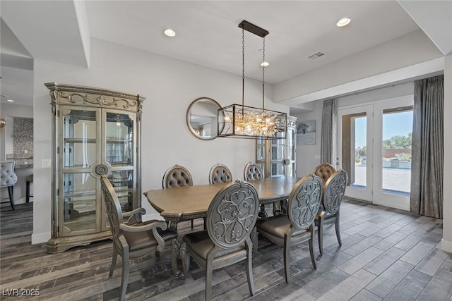 11088 Westcroft Way, Las Vegas, NV 89183 - dining area with wood finished floors, a chandelier, recessed lighting, and baseboards