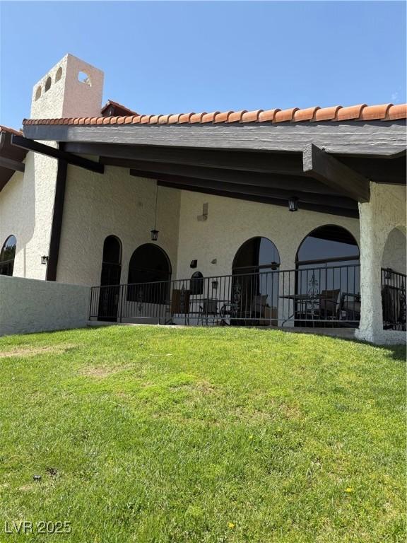 2100 Plaza Del Padre, Las Vegas, NV 89102 - back of house with stucco siding and a tiled roof