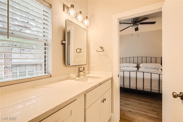251 S Green Valley Pkwy Unit 1311, Henderson, NV 89012 - bathroom with a ceiling fan, wood finished floors, healthy amount of natural light, and vanity