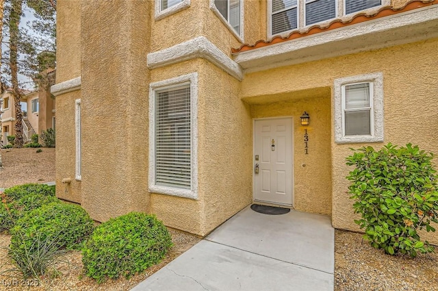 251 S Green Valley Pkwy Unit 1311, Henderson, NV 89012 - doorway to property featuring stucco siding