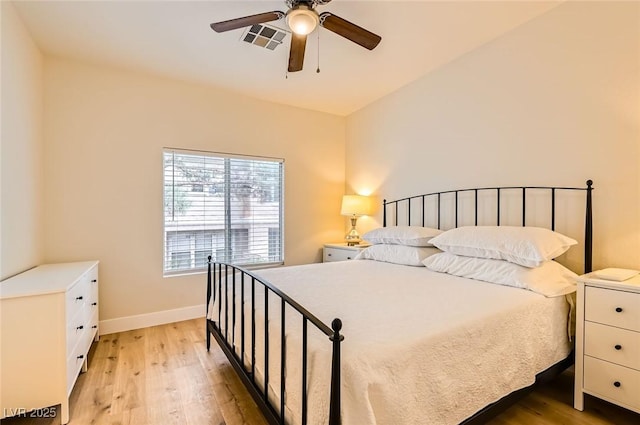 251 S Green Valley Pkwy Unit 1311, Henderson, NV 89012 - bedroom featuring light wood-style flooring, baseboards, and a ceiling fan