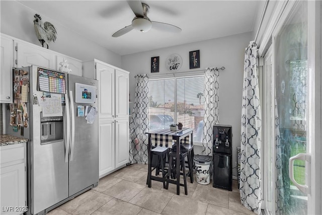 7929 Ben Hogan Dr, Las Vegas, NV 89149 - dining space featuring a ceiling fan and light tile patterned flooring