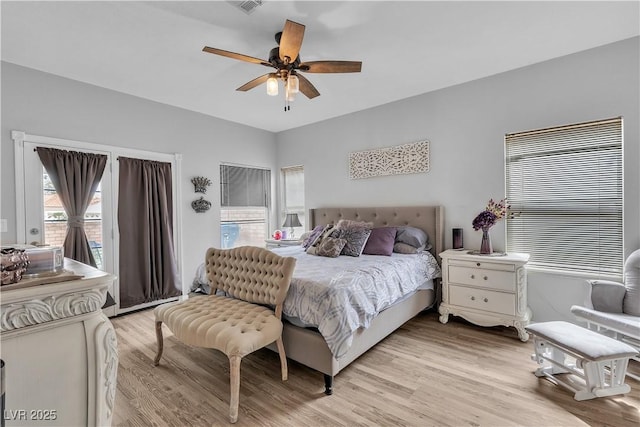 7929 Ben Hogan Dr, Las Vegas, NV 89149 - bedroom with light wood-style flooring, access to outside, and a ceiling fan