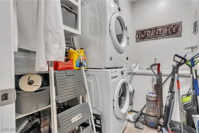 7929 Ben Hogan Dr, Las Vegas, NV 89149 - laundry area with stacked washer / dryer
