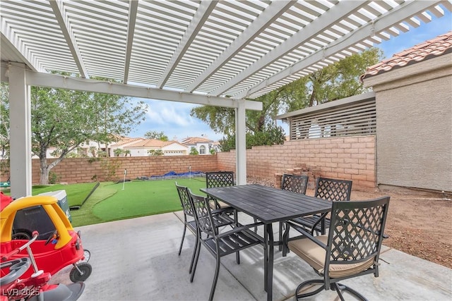 7929 Ben Hogan Dr, Las Vegas, NV 89149 - view of patio featuring a putting green, outdoor dining area, a fenced backyard, and a pergola