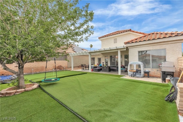 7929 Ben Hogan Dr, Las Vegas, NV 89149 - rear view of house with a pergola, a putting area, a patio, and a fenced backyard