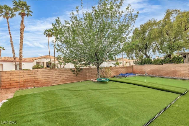 7929 Ben Hogan Dr, Las Vegas, NV 89149 - fenced backyard with an area to practice putting