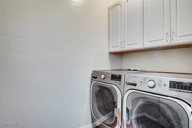 248 Windmill Croft Dr, Las Vegas, NV 89148 - laundry room featuring cabinet space, washing machine and clothes dryer, and baseboards