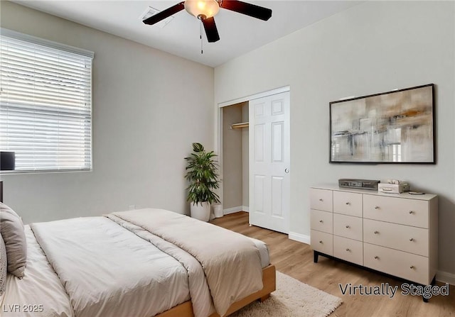 248 Windmill Croft Dr, Las Vegas, NV 89148 - bedroom with light wood-type flooring, a closet, ceiling fan, and baseboards