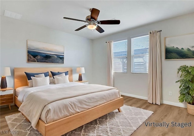 248 Windmill Croft Dr, Las Vegas, NV 89148 - bedroom featuring wood finished floors, baseboards, and ceiling fan